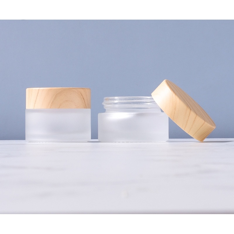 2024 New Style Very Popular Glass Jars Frosted clear  Glass Jars with Bamboo Lids for Cosmetic