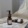 High-End 80ml Amber Plastic Essential Oil Bottle with Lotion Pump Serum Bottle Sample with Wood Grain Cap