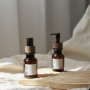 High-End 80ml Amber Plastic Essential Oil Bottle with Lotion Pump Serum Bottle Sample with Wood Grain Cap