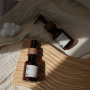 High-End 80ml Amber Plastic Essential Oil Bottle with Lotion Pump Serum Bottle Sample with Wood Grain Cap