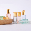 clear bottle with gold cap