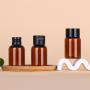 Luxury Design 50ml Brown Plastic Bottle Refillable Container with Custom Label for Skin Care Brands