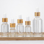 Wholesale Cosmetic Empty Hair Oil Bottles Packaging Customized Private Label Essential Oil Glass Bottle for Hair Oil