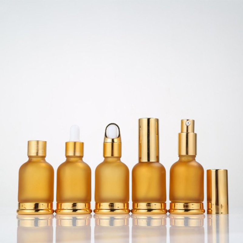 New Design Gold 30ml Essential Oil Pump Bottle Cosmetic Spray Glass Bottle for Skin Care Serum