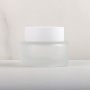 Wholesale Amber 50g Glass Cosmetic Frosted Jar for Creams and Balms Skincare Packaging with Black Lid