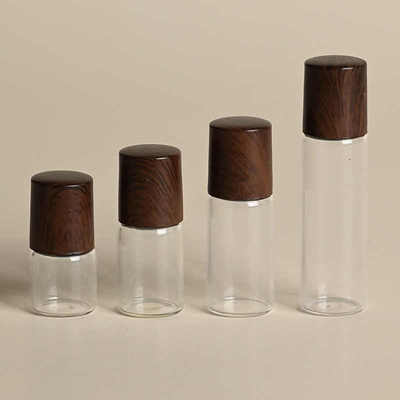 Custom Small Portable 1ml 2ml 3ml 5ml Empty Clear Frosted Amber Color Glass Eye Care Skincare Roll On Bottle with Wood Lid
