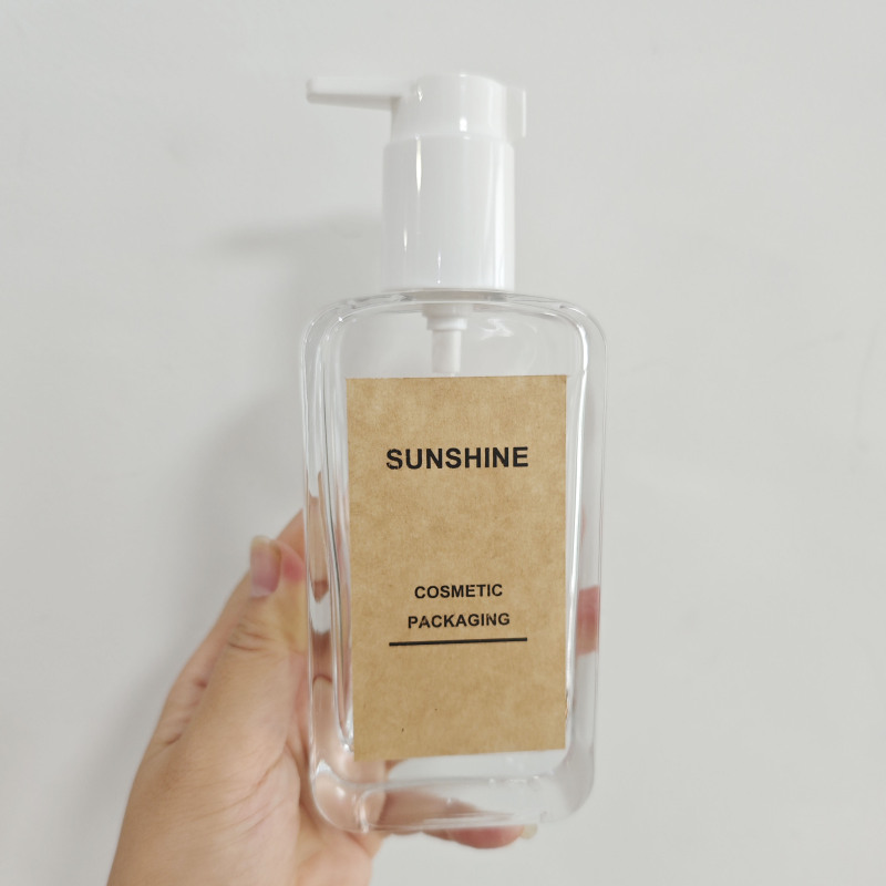 OEM/ODM Accepted 5oz Luxury Glass Body Oil Bottle with Pump for Skin Care Flat Shape Skincare Packaging for Face Cream