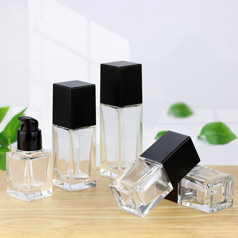 Low MOQ Empty 30ml clear square Glass Cosmetic Black Press Pump Liquid Foundation Bottle