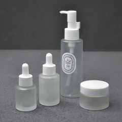Skincare Set Eco-Friendly Flat Empty Packaging 50g Cream Jar Glass Frosted 30ml Essential Oil Bottle 100ml Lotion Pump Bottles