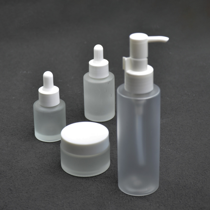 Custom Frosted Glass Skincare Set 30g Glass Jars Cream Jar Custom Cosmetic Containers White Pump Luxury Essential Oil Bottle