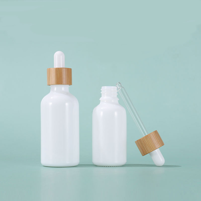 Hot Selling 15ml 30ml 50ml 100ml Empty Essential Oil Glass Dropper Bottle With Bamboo Lids