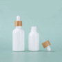Hot Selling 15ml 30ml 50ml 100ml Empty Essential Oil Glass Dropper Bottle With Bamboo Lids