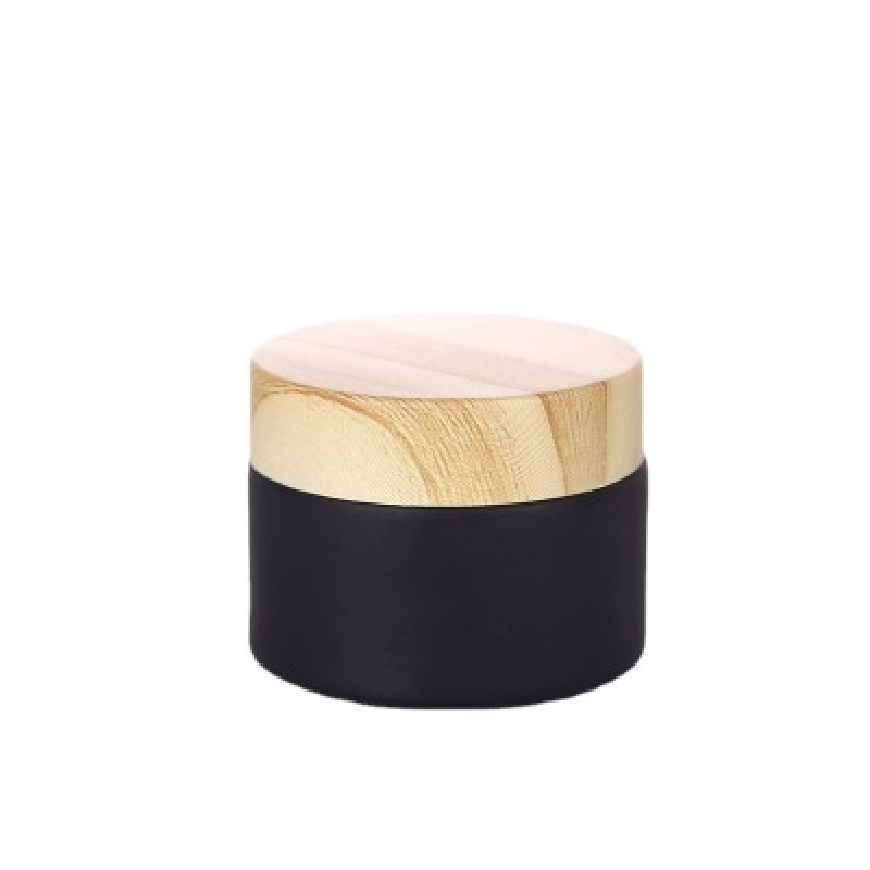Wholesale High Quality 10g 20g 30g 50g Matte Black Clear Frosted Flat Round Glass Jars With Wooden Grain Plastic Lid