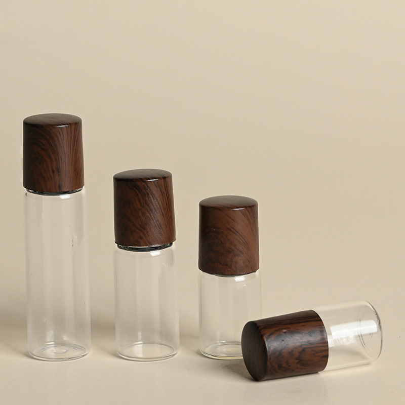 Online Best Service 1ml 2ml 3ml 5ml Frosted Clear Amber Glass Rollerball Bottle with Wood Grain Cap for Eye Serum