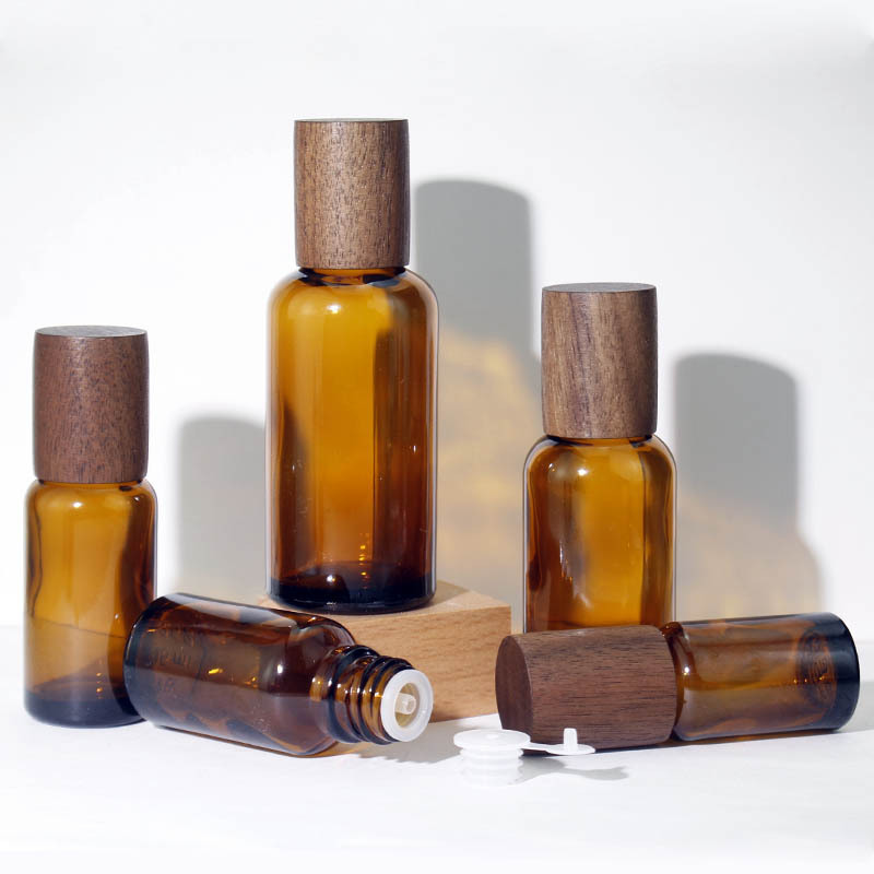 Custom Brown Glass Bottles 10ml 100ml Private Label Wood Lid Bottle Packaging for Luxury Essential Oils