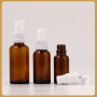 Skin Care Packaging 5ml to 15ml Round Shoulder Glass Lotion Bottles with Screw Cap and Pump