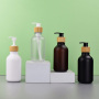 Matte Black 300ml PET Plastic Hotel Hair Shampoo Bottle with Wooden Color Pump Minimum Order Quantity 100pcs