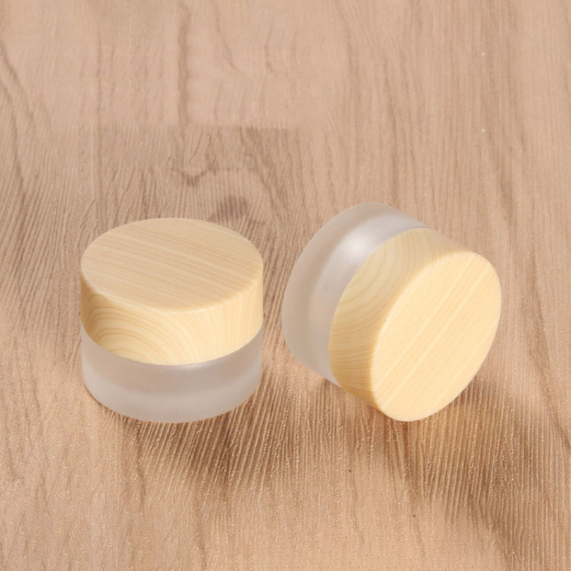 Wholesale 5g Frosted Glass Cosmetic Jar Skincare Round Cream Glass Jar With Custom Printing Bamboo Color Lid Glass Jar