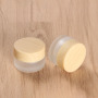 Wholesale 5g Frosted Glass Cosmetic Jar Skincare Round Cream Glass Jar With Custom Printing Bamboo Color Lid Glass Jar