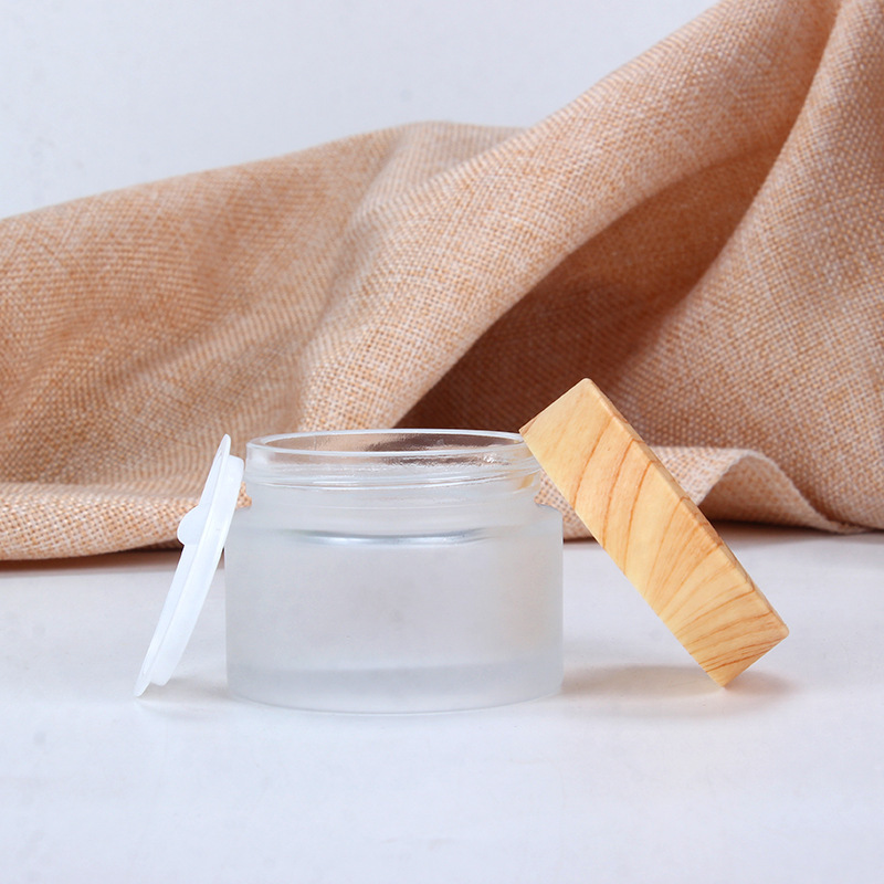 5g10g15g30g50g100g Luxury Empty Cream Cosmetic Frosted clear Glass Jars with Wood Grain Lids
