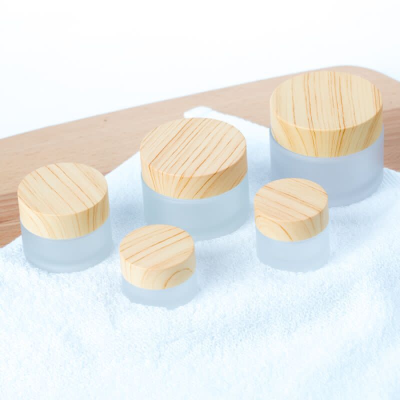 5g10g15g30g50g100g Luxury Empty Cream Cosmetic Frosted clear Glass Jars with Wood Grain Lids