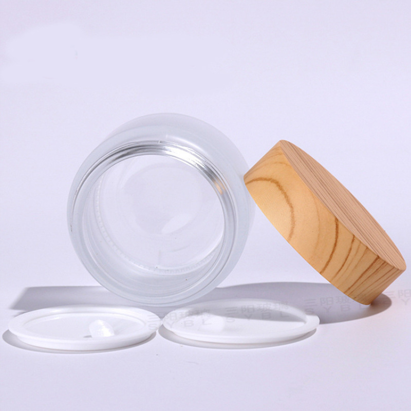 5g10g15g30g50g100g Luxury Empty Cream Cosmetic Frosted clear Glass Jars with Wood Grain Lids