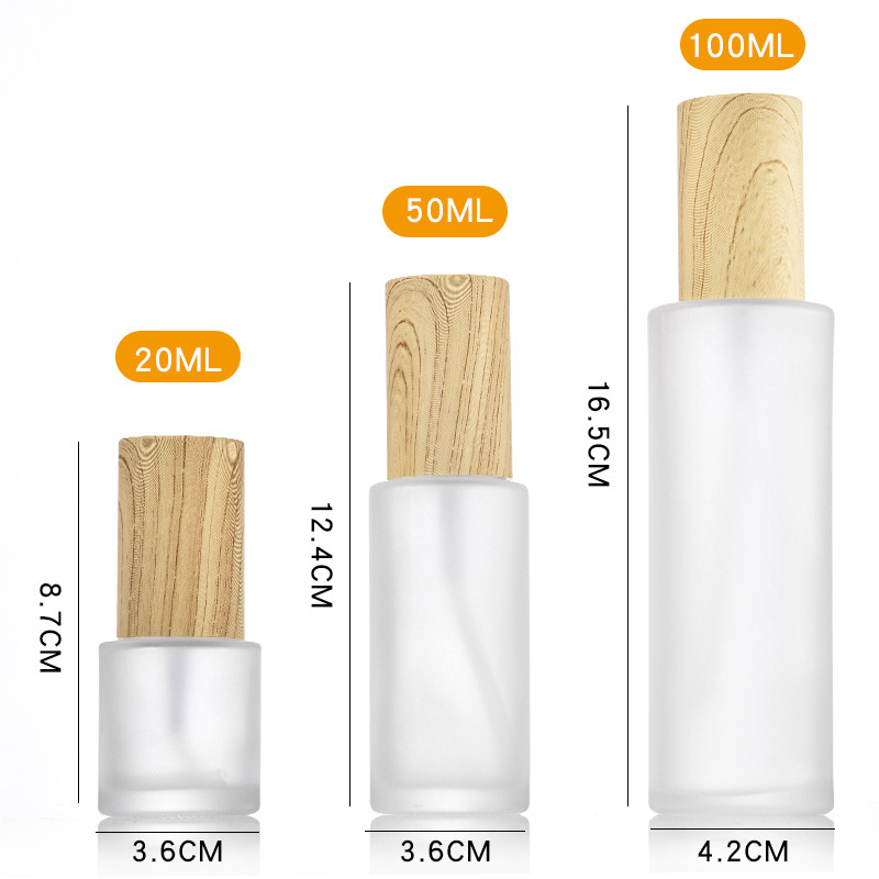 Empty 50ml 100ml 120ml Frosted Glass Pump Bottle Glass Spray Bottle With Wooden Color Cover