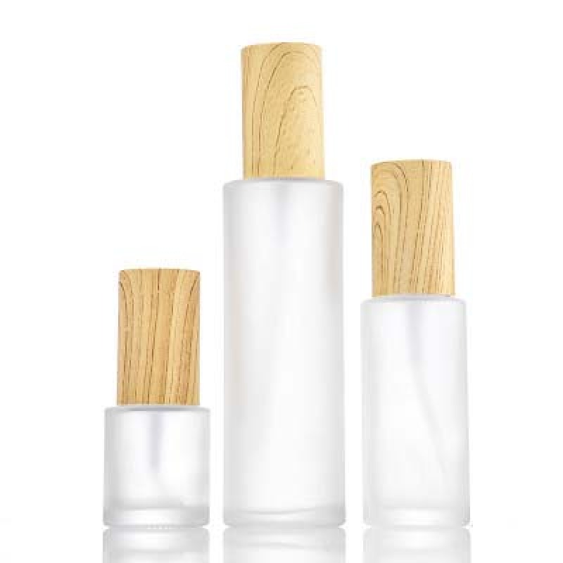 Empty 50ml 100ml 120ml Frosted Glass Pump Bottle Glass Spray Bottle With Wooden Color Cover