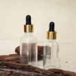 Clear with gold dropper