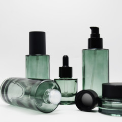 High-end Cosmetic Packaging Set 50g 30ml 50ml 100ml 120ml Flat Shoulder Glass Lotion Pump Serum Dropper Bottles Cream Jars