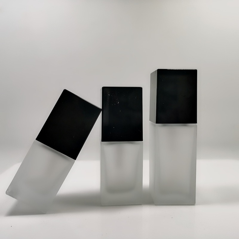 China Made 30ml square clear Cosmetic Black Cap Glass Frosted Lotion Bottle With Pump for Foundation