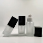 China Made 30ml square clear Cosmetic Black Cap Glass Frosted Lotion Bottle With Pump for Foundation