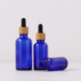 2025 New Year Custom Glass Bottles for Cosmetic Serum and Essential Oil 5ml to 100ml Blue Green Amber Dropper Sealing Gift