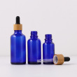 Blue bottle with bamboo dropper