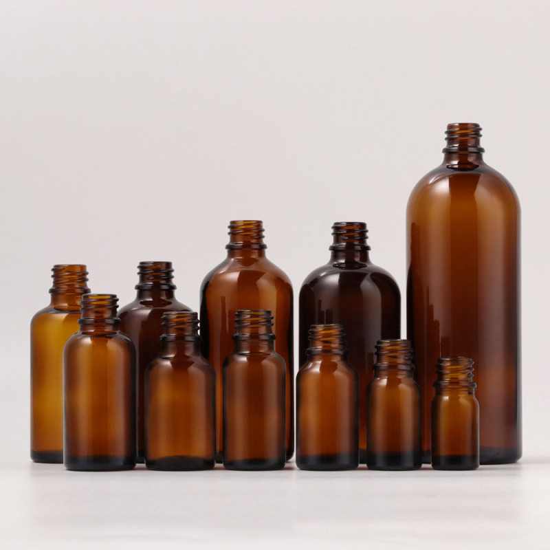 2025 New Year Custom Glass Bottles for Cosmetic Serum and Essential Oil 5ml to 100ml Blue Green Amber Dropper Sealing Gift