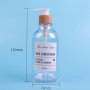 Customizable 500ml Transparent PET Plastic Shampoo Bottles with Bamboo Collar and White Pump