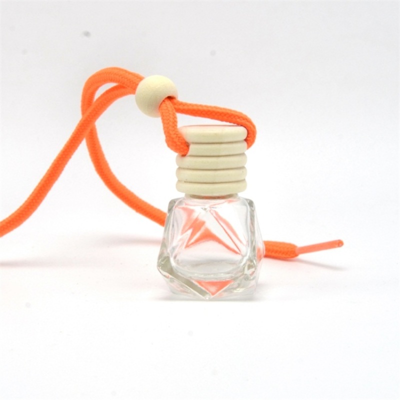 Yiwu Wholesale Price Clear Round Hanging Bottle 5ml 8ml Empty for Car Perfume with Colorful Rope Crown Cap Wood Cap Included