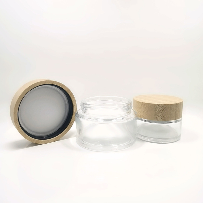 In Stock Empty Recyclable Glass Jars for Skincare Facial Cream 50g Plastic Lid Clear Round Cosmetic Jar