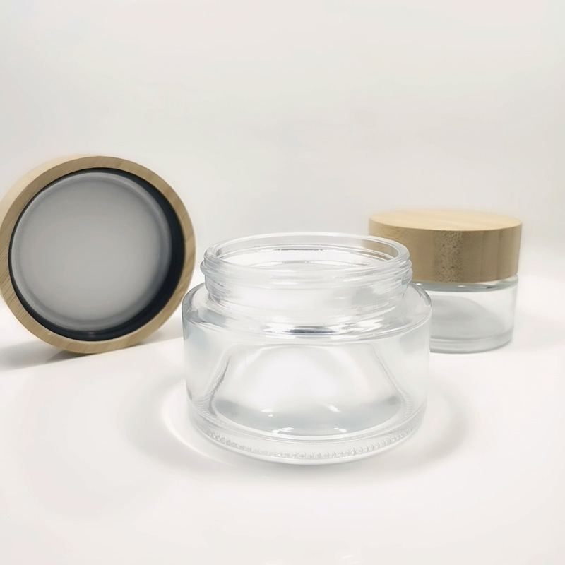 In Stock Empty Recyclable Glass Jars for Skincare Facial Cream 50g Plastic Lid Clear Round Cosmetic Jar