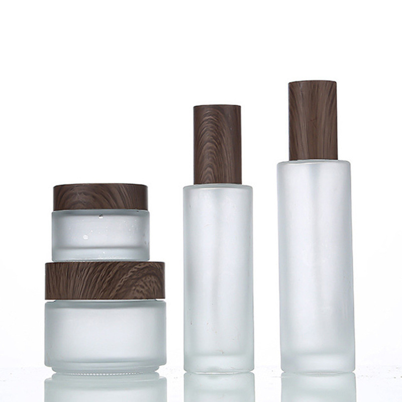 100ml 120ml Frosted Glass Serum Bottle Round Cosmetic Packaging with Press Pump for Body Lotion Sealed by Pump Sayer