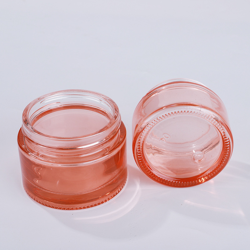 China Factory Wholesale Custom Made 50g Cosmetic Fancy Glass Jars with Plastic Lids for Face Cream and Skin Care