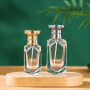 Custom Unique Shape Transparent Glass Perfume Bottle 30ml 50ml Gold Silver Black Sprayer with Luxury Round Cap