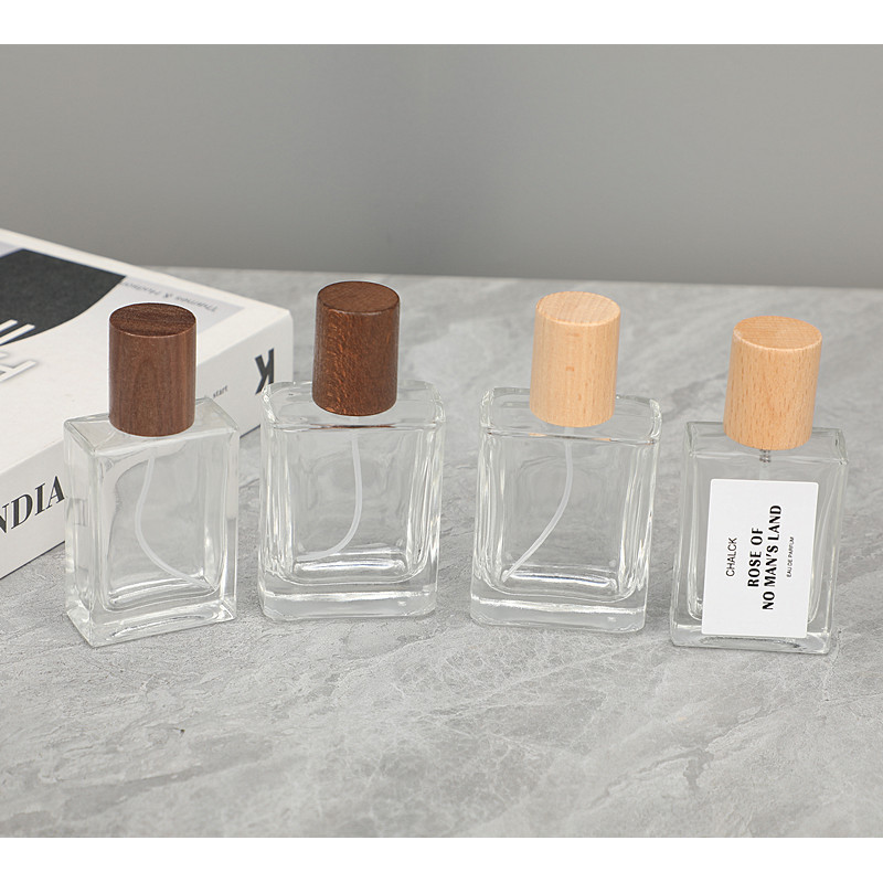 Refillable Empty Perfume Bottles 30ml 50ml Thick Bottom Square Glass Perfume Bottles with High-end Wooden Caps