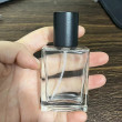 Clear bottle with black wooden Cap
