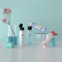 Low MOQ 60ml PET Amber clear Blue and Customized Colors Skincare Packaging Container Squeeze Plastic Shampoo Body Lotion Bottle