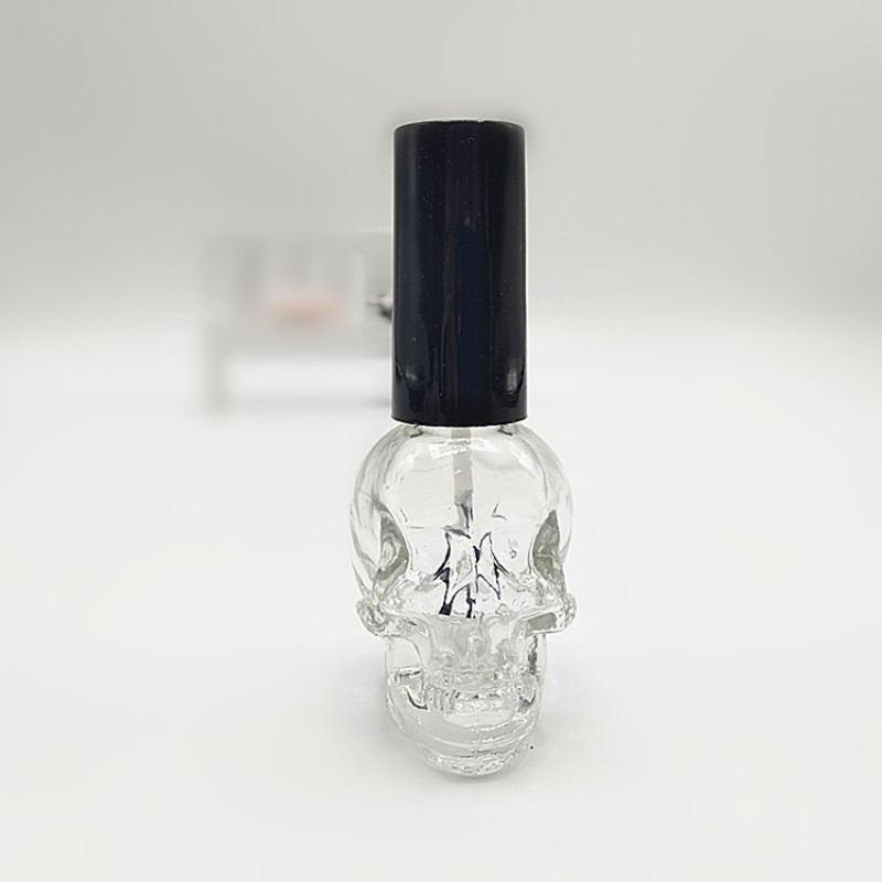 Luxury 10ml Clear Glass Nail Polish Bottles Empty Skull Shape with Integrated Brush for Nail Polish Oil Packaging
