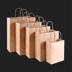 La manija de la cuerda marrón reciclable reutilizada empaqueta la comida de la bolsa de papel de Kraft de la parte inferior cuadrada