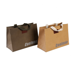 Venta caliente de diferentes tipos de bolsas de papel con asas kraft marrón a la venta
