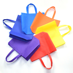 Commerce de gros en stock Promotion couleur Eco Shopping fourre-tout empaquetant le sac non tissé