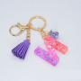 Men and Womens Best Gift Colorful Resin Letter Keychain Small Ball and Tassel Key Chain for Sale 2021